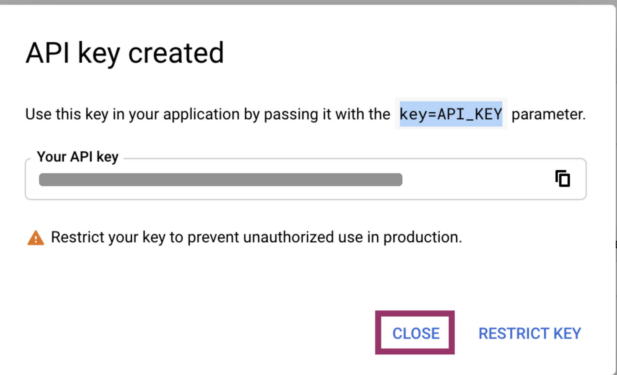 A screenshot of an API key created message, also showing the field with the generated API key