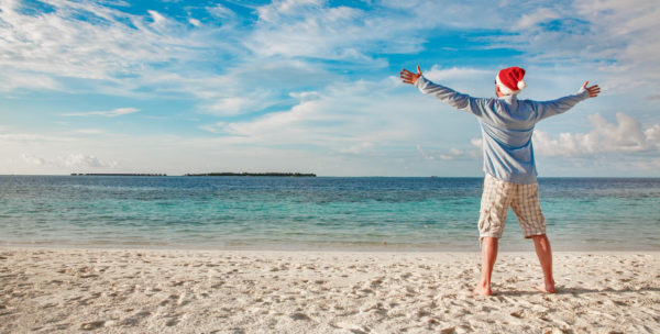 holiday season preparations: santa on beach