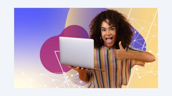an image of a woman holding a laptop and giving a thumbs up